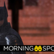 Robert Pattinson's Batman glowers in the rain.